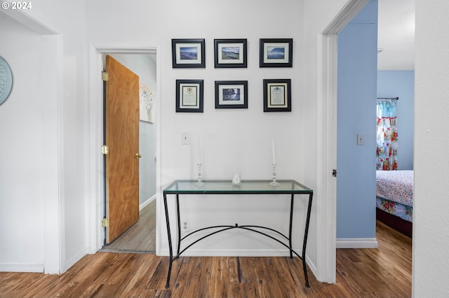 hallway featuring hardwood / wood-style flooring