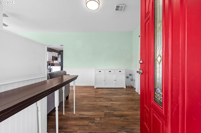 entrance foyer with dark hardwood / wood-style flooring