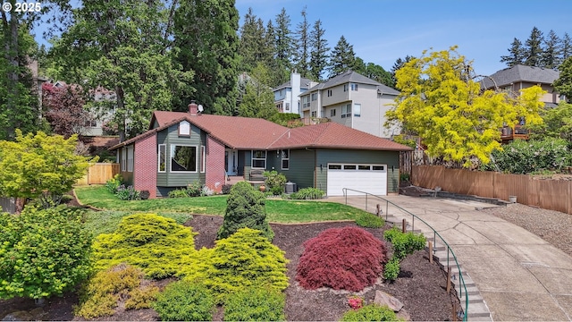 ranch-style house featuring fence, concrete driveway, an attached garage, central air condition unit, and a chimney