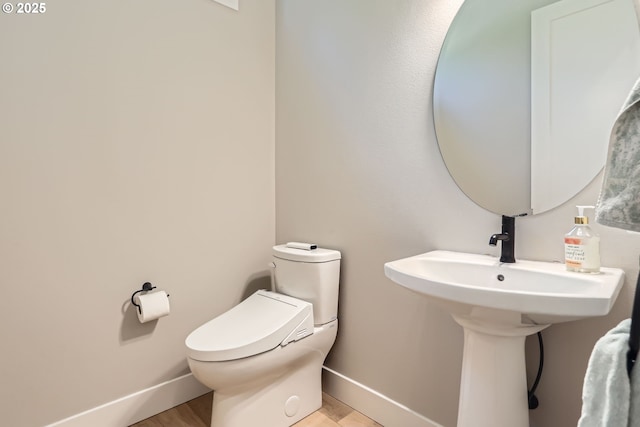 7414 SW 80th Ter, Portland, OR 97223 - bathroom with baseboards and wood finished floors