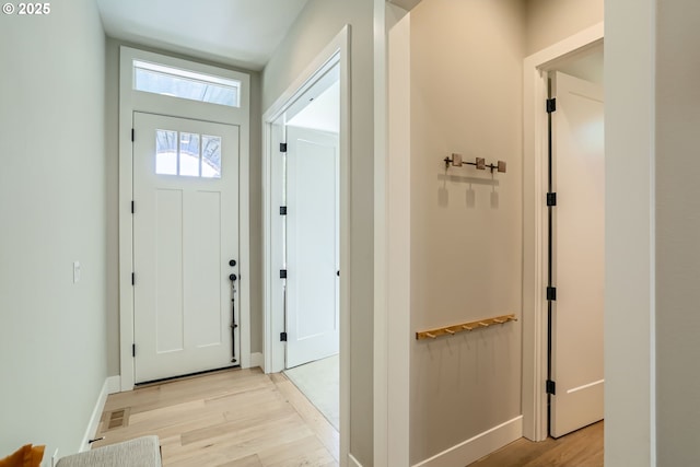 7414 SW 80th Ter, Portland, OR 97223 - foyer entrance with light wood finished floors and baseboards