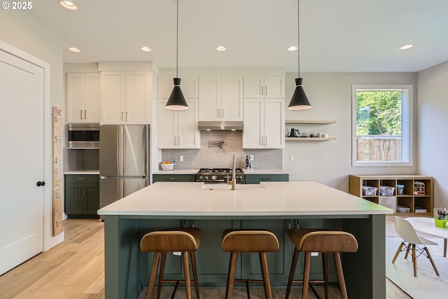 7414 SW 80th Ter, Portland, OR 97223 - kitchen with appliances with stainless steel finishes, decorative backsplash, light wood-style floors, recessed lighting, and open shelves