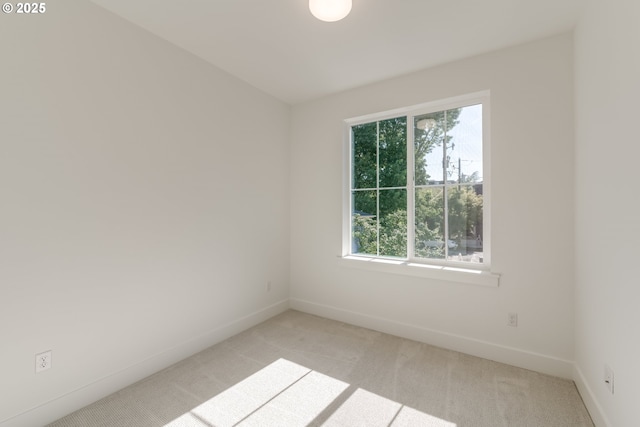 3727 N Michigan Ave, Portland, OR 97227 - empty room with light carpet and baseboards