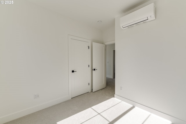 3727 N Michigan Ave, Portland, OR 97227 - spare room with an AC wall unit and carpet flooring