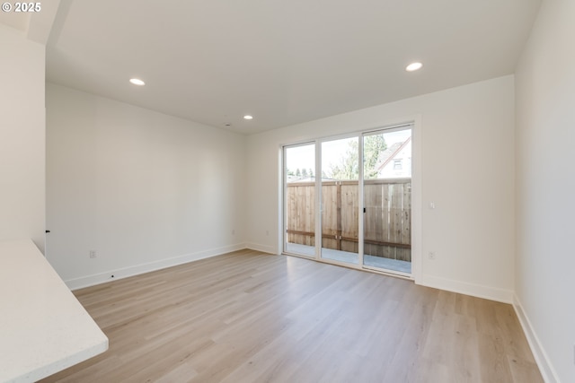 3727 N Michigan Ave, Portland, OR 97227 - unfurnished room featuring light wood-style floors and recessed lighting