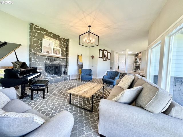 1082 E Highland Ave, Hermiston, OR 97838 - carpeted living area featuring a chandelier, plenty of natural light, and a fireplace