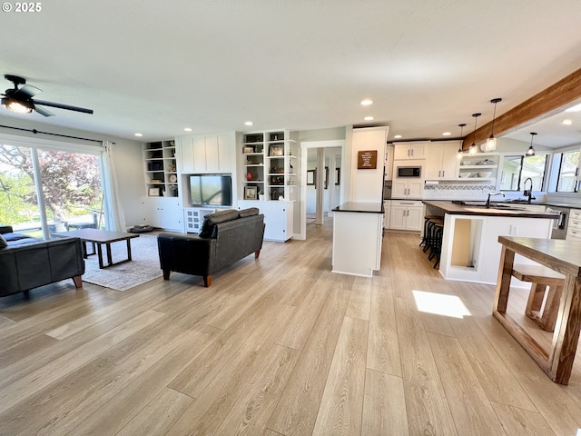 1082 E Highland Ave, Hermiston, OR 97838 - living room with light wood-type flooring, ceiling fan, and recessed lighting