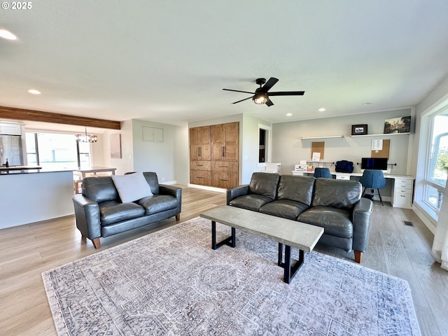 1082 E Highland Ave, Hermiston, OR 97838 - living area with light wood finished floors, ceiling fan, recessed lighting, and a chandelier