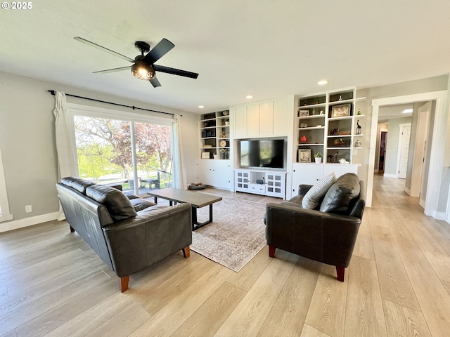 1082 E Highland Ave, Hermiston, OR 97838 - living room with baseboards, light wood finished floors, a ceiling fan, recessed lighting, and built in features