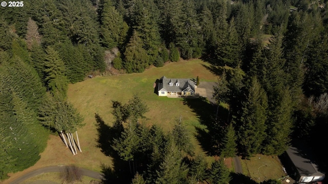 bird's eye view featuring a view of trees