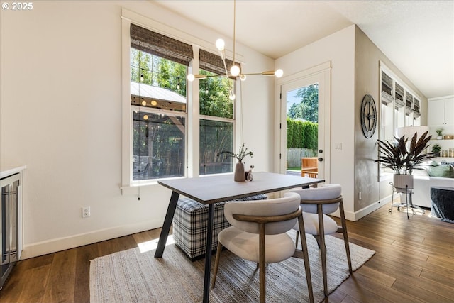 8614 SW Logan Ln, Tualatin, OR 97062 - dining area featuring baseboards and wood finished floors