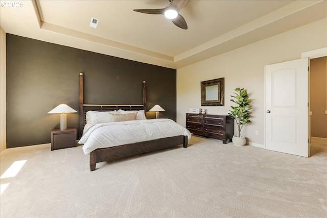 8614 SW Logan Ln, Tualatin, OR 97062 - bedroom with carpet, a tray ceiling, a ceiling fan, and baseboards