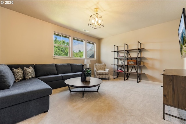 8614 SW Logan Ln, Tualatin, OR 97062 - living area featuring a chandelier, light colored carpet, and baseboards