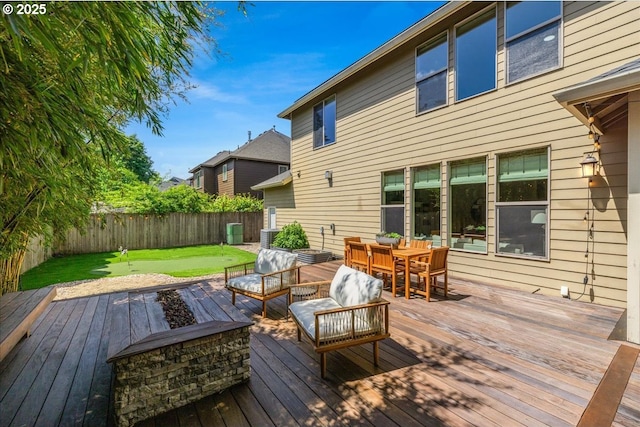 8614 SW Logan Ln, Tualatin, OR 97062 - wooden terrace with outdoor dining area and an outdoor living space