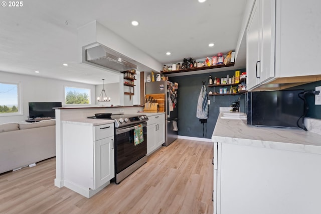 35208 Orchard Ln, Astoria, OR 97103 - kitchen with stainless steel appliances, open shelves, white cabinetry, light wood-style flooring, and recessed lighting