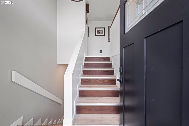 35208 Orchard Ln, Astoria, OR 97103 - stairway with wood finished floors