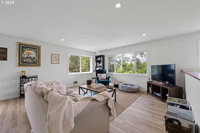 35208 Orchard Ln, Astoria, OR 97103 - living area with baseboards, light wood-type flooring, and recessed lighting