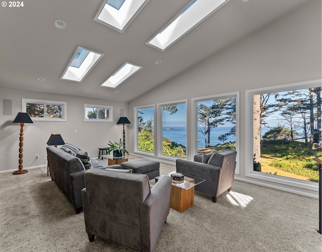 living room featuring a water view, light colored carpet, and high vaulted ceiling