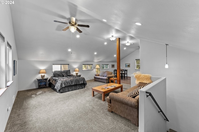 carpeted bedroom featuring multiple windows, lofted ceiling, and ceiling fan