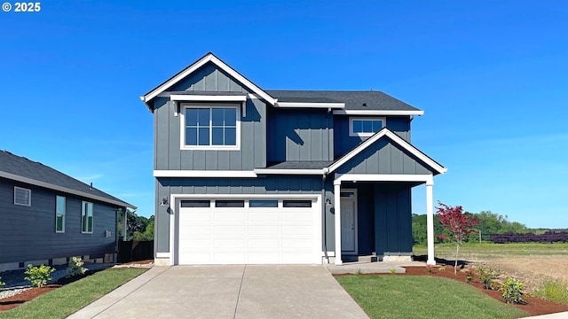 1587 Logan Pkwy SE, Albany, OR 97322 - view of front of home with a garage, concrete driveway, a front yard, a shingled roof, and board and batten siding