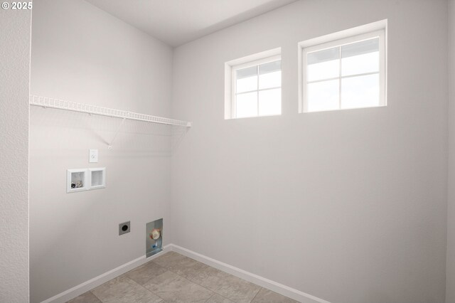 1587 Logan Pkwy SE, Albany, OR 97322 - washroom with hookup for an electric dryer, hookup for a washing machine, baseboards, and light tile patterned flooring