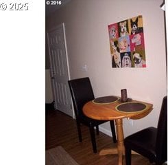 dining space featuring wood finished floors