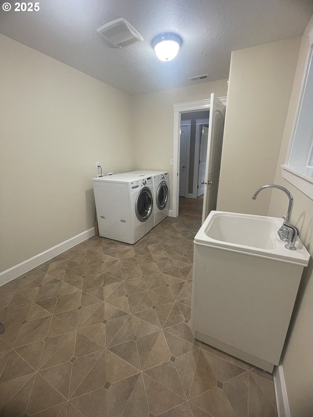 24945 Oak Ln, Elmira, OR 97437 - washroom with independent washer and dryer and baseboards