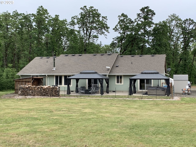 24945 Oak Ln, Elmira, OR 97437 - back of property with a gazebo, a shingled roof, a yard, and a patio area