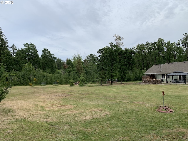 24945 Oak Ln, Elmira, OR 97437 - view of green lawn with a gazebo and a wooded view