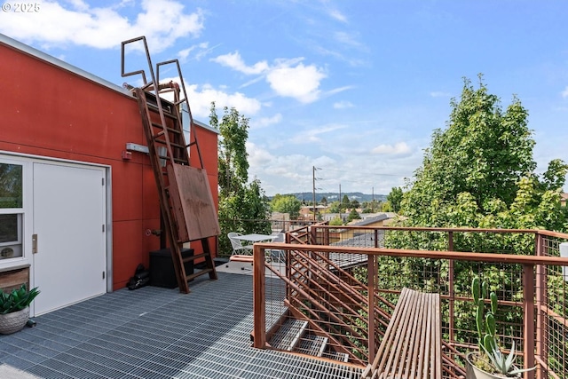 wooden balcony featuring a wooden deck