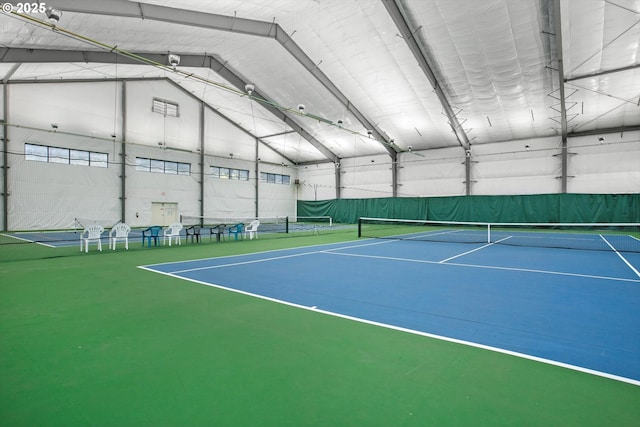 view of tennis court with fence