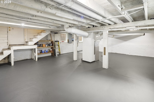 209 NE Fargo St, Portland, OR 97212 - unfinished basement with stairs, electric panel, and heating unit