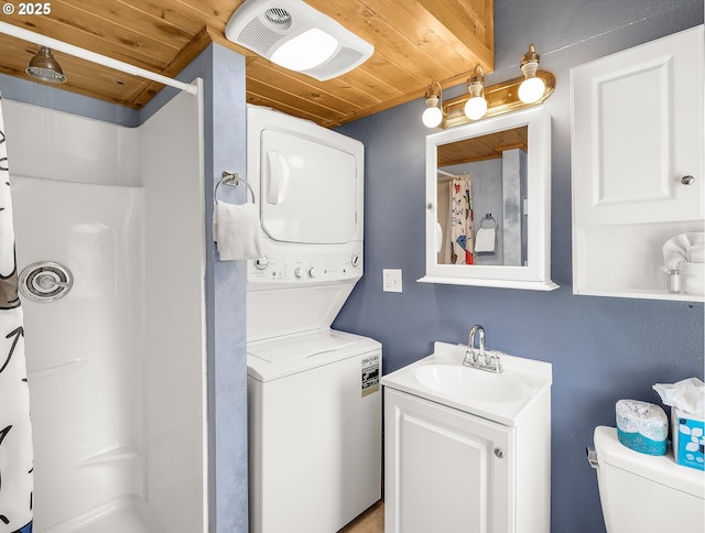 5353 SW Neal Ave, Waldport, OR 97394 - bathroom with stacked washing machine and dryer, wood ceiling, a shower with curtain, and vanity