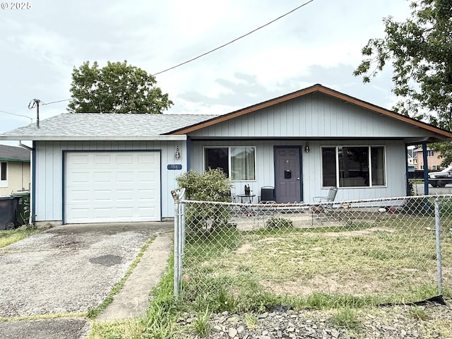 155 Mcmichael St, Saint Helens, OR 97051 - view of front of home featuring a fenced front yard, an attached garage, asphalt driveway, covered porch, and a shingled roof