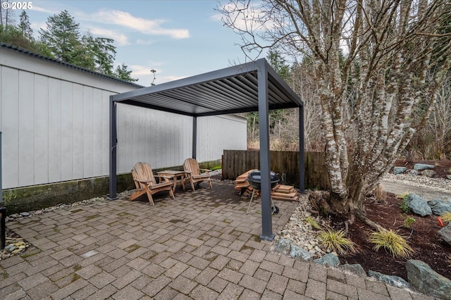 view of patio / terrace featuring fence