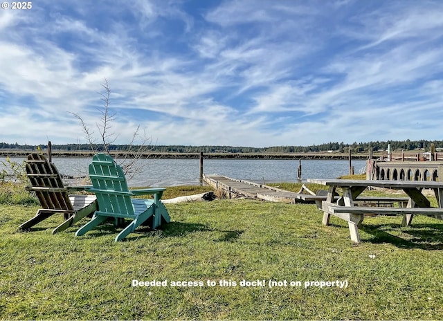88388 Pederson Dr, Bandon, OR 97411 - view of green lawn with a water view and a dock
