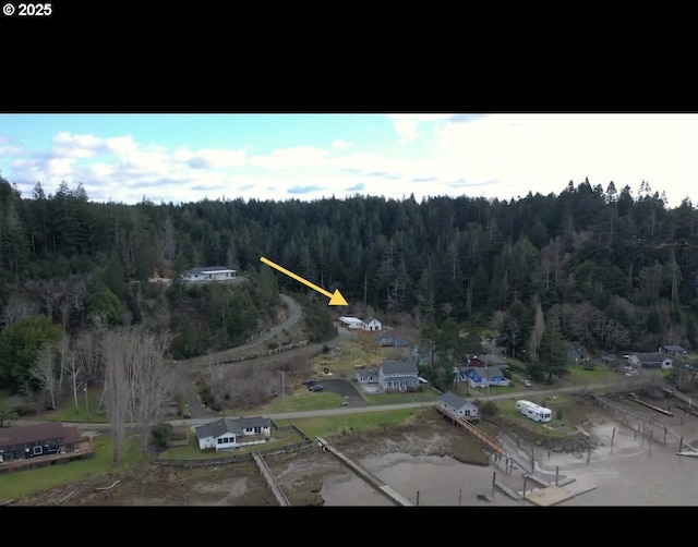88388 Pederson Dr, Bandon, OR 97411 - aerial overview of property's location featuring a heavily wooded area
