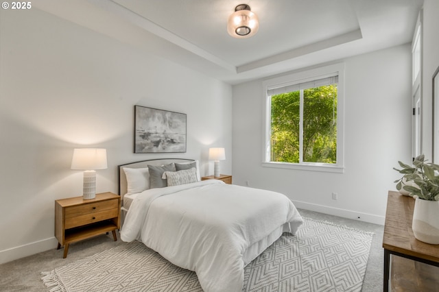 11723 NW Sadie St, Portland, OR 97229 - bedroom featuring carpet floors, baseboards, and a tray ceiling