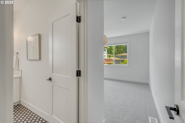 11723 NW Sadie St, Portland, OR 97229 - hall featuring baseboards and carpet