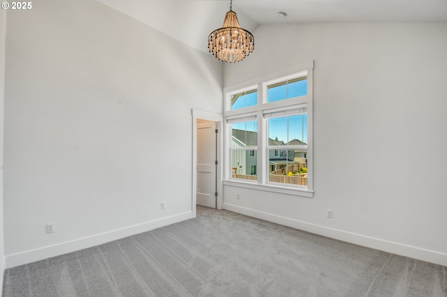 11723 NW Sadie St, Portland, OR 97229 - spare room with a chandelier, baseboards, carpet flooring, and high vaulted ceiling