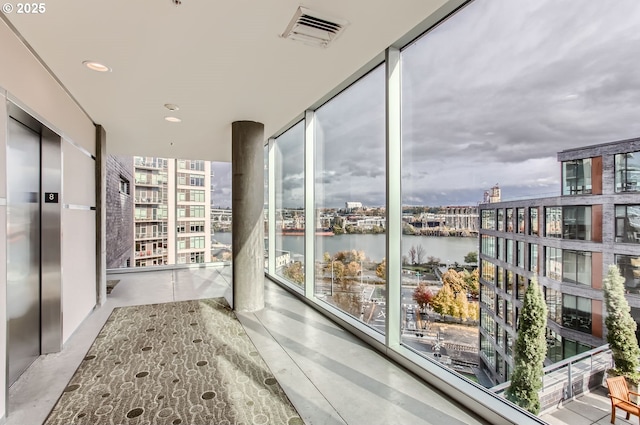 1255 NW 9th Ave Unit 806, Portland, OR 97209 - balcony featuring a water view, a city view, elevator, and visible vents