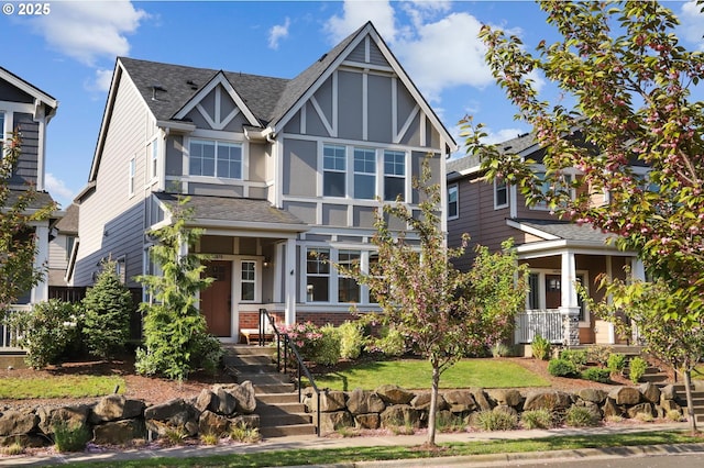 14878 NW Olive St, Portland, OR 97229 - english style home with brick siding, a shingled roof, and stucco siding