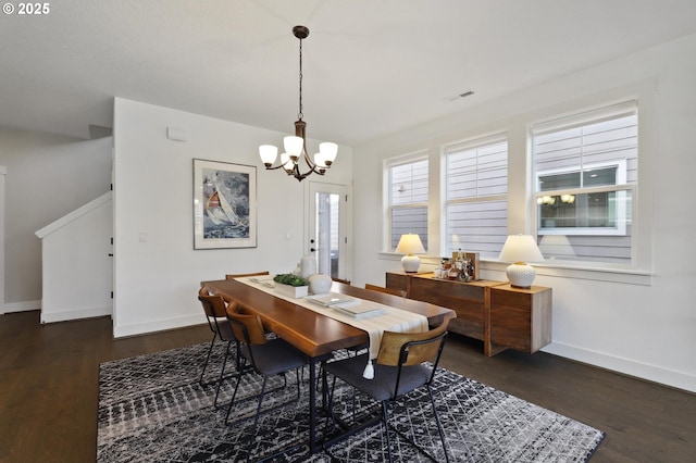 14878 NW Olive St, Portland, OR 97229 - dining area with baseboards, visible vents, dark wood-style floors, and a chandelier