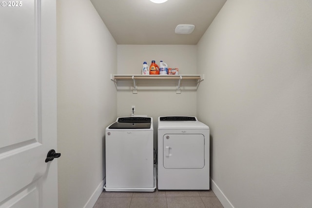 14878 NW Olive St, Portland, OR 97229 - washroom with laundry area, washing machine and dryer, baseboards, light tile patterned floors, and bar area