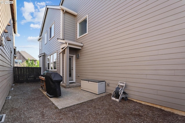 14878 NW Olive St, Portland, OR 97229 - rear view of house with a patio and fence