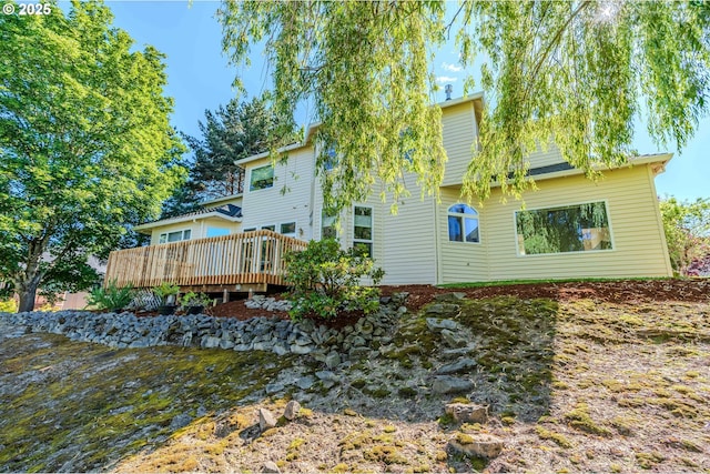 2525 NW 141st Pl, Portland, OR 97229 - rear view of house with a wooden deck