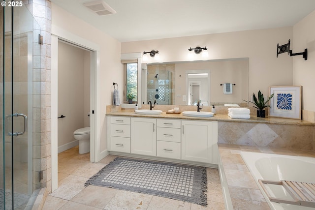 full bathroom featuring vanity, tile patterned flooring, plus walk in shower, and toilet