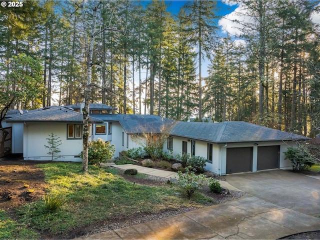 single story home with a garage