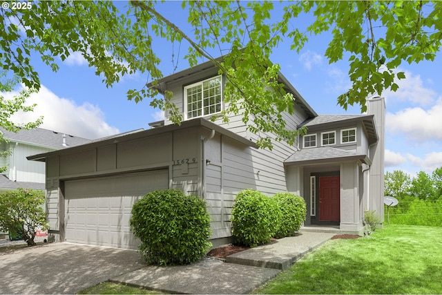 15629 NW Energia St, Portland, OR 97229 - view of front of house with concrete driveway and a chimney