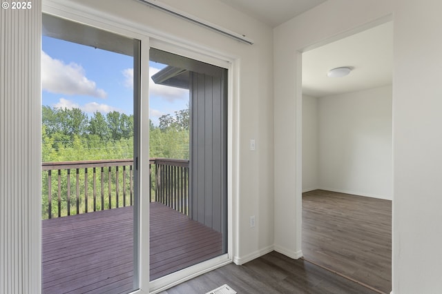 15629 NW Energia St, Portland, OR 97229 - entryway featuring dark wood-style floors and baseboards